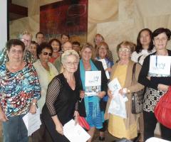 Students holding their Certificates at the end of a course